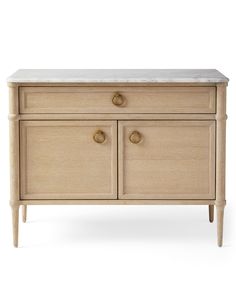 the sideboard is made from wood and has two drawers, one with marble top