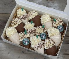 a box filled with chocolate covered strawberries and topped with whipped cream, starbucks logo