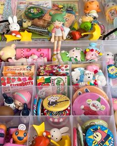 an assortment of toy items in plastic containers