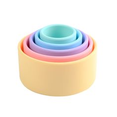 four pastel bowls stacked on top of each other