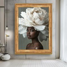 a woman with a large white flower on her head in front of a framed photo