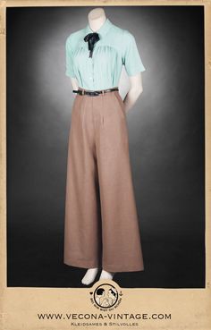 "Oh, boy! Tip your hat! These timeless Marlene trousers with their ingenious zipper opening hidden in the side pocket combine feminine and masculine elements just perfectly. The high waistband with a pointy fishtail detail and four belt loops make this easy to style and adjust. Several darts in the back provide for beautiful curves, the wide and slightly flared leg add just the right amount of coolness. High-quality linen blend makes the elegant trousers wonderfully easy to care for, ensures opt 1940 Trousers Women, Turn Of The Century Fashion, 1920s Womens Fashion Casual, Vintage Brown Bottoms For Workwear, Vintage High-waisted Brown Pants, Vintage Brown High-waisted Pants, Vintage Brown Wide Leg Pants, Vintage High-waist Beige Pants, Fitted Vintage Linen Bottoms