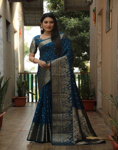 Type: Saree Saree Color: Crystal Teal Blouse Color: Crystal Teal Saree Length: 6.3 Mtrs (With Blouse) Blouse Length: 0.80 Mtr Fabric: Dola Silk Work: Zari Weaving Care Instruction: Hand Wash Product Code: 12855 Teal Saree, Dola Silk Saree, Teal Blouse, Prussian Blue, Blue Saree, Kanjivaram Sarees