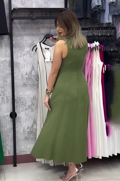 Description Style: BasicCombination: SingleSkirt Length: Long SkirtSkirt Type: A-Line SkirtNeck Type: U-LineSleeve Type: SleevelessSleeve Length: SleevelessWaist Type: Mid-WaistColor: Army Green, Black, ApricotSize: S, M, L, XL, XXLPlacket: Buttonless Size Chart Chest: Place the tape close under the armhole and measure from side seam to side seam. Waist: This is the narrowest part of the waist. Place the tape from side to side directly at the waistline. Hip: Place the tape approximately 7–9 inches below the natural waistline and measure from side to side at the hip line. Flare: This is the length of the flare of your dress. Flare is the bottom wide length of your dress. Strap to Hem: This is the length from the top of the strap down to the hem. Waist to Hem: This is the length from the top Evening Dresses Short, Womens Workout Outfits, U Neck, Side To Side, Types Of Skirts, British Indian, Skirt Length, Long Skirt, A Line Skirts