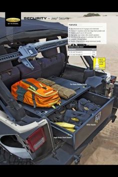 there is an open trunk in the back of a vehicle that has items inside it