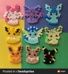 several different types of beaded animal pins