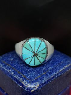 This stunning vintage ring has skillfully been crafted by native American Zuni silversmiths featuring natural turquoise Gemstones set in sterling silver, the ring is unmarked and been tested for silver.  UK size - U  US size - 10  Message me any questions  ITEM - S1900 American Turquoise, Native American Turquoise, Natural Turquoise, Turquoise Gemstone, Rings Statement, Vintage Rings, Statement Rings, Sterling Silver Rings, Mens Jewelry