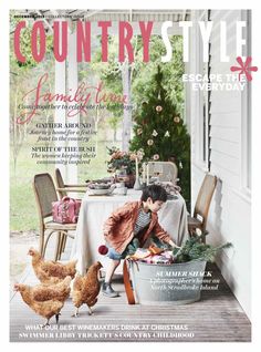 the cover of country style magazine featuring a little boy and chickens in front of a table