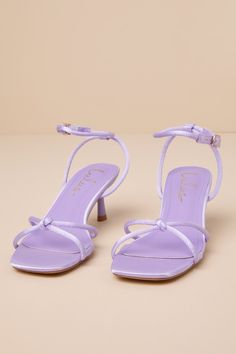 You'll be obsessed with finding all the cute ways to style the Lulus Hewett Lilac Satin Ankle Strap Low Heel Sandals this season! Sleek woven satin shapes a squared-toe bed and slender, knotted crisscrossing straps that create a peep-toe upper. Matching straps sprout from the sides to wrap and secure around the ankle with a shiny gold buckle, all atop a trendy spool heel. 2. 5" spool heel. Cushioned insole. Felted rubber sole has nonskid markings. Man made materials. Imported. Lulus | Hewett Lil Lilac Heels, Short Heels, Spool Heel, Low Heel Sandals, Sandal Heels, Heel Sandal, Spring Shoes, Ankle Straps, Heel Sandals