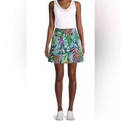 Size 2 Lilly Pulitzer's Monica Skirt Boasts A Bright Floral Motif. Enhanced With A Moisture-Wicking Fabric, This Style Protects From The Sun With A Upf 50+ Finish. Pull-On Style 97% Cotton/3% Spandex Machine Wash Imported Size & Fit About 17" Length Floral Print Vacation Skort, Spring Green Skirt With Tropical Print, Spring Tropical Print Green Skirt, Spring Green Tropical Print Skirt, Tropical Print Skirt For Day Out, Multicolor Lined Skort For Vacation, Spring Day Out Tropical Print Skirt, Spring Tropical Print Skirt For Day Out, Multicolor Summer Skort With Lined Skirt