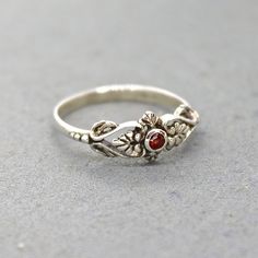 "Garnet silver ring for women, Victorian silver ring, Great everyday ring. Also available with Opal, Zircon and in gold plating or real solid 14k gold 🌸 Features: Handmade ring 🌸 Measurments: Weight - 1.3g Width - 0.27\" (7 mm) Stone diameter - 0.07\" (2 mm) 🌸Materials: Sterling Silver Garnet 🌸 More info: All my jewelry is carefully wrapped and shipped in a lovely gift box, ready to be given as a gift. ♥ For the same ring in 14k gold, click here: https://www.etsy.com/il-en/listing/758212463/ Old Rings Vintage Silver, Antique Silver Ring, Heirloom Sterling Silver Toe Ring, Vintage Sterling Silver Stackable Rings Gift, Silver Ruby Open Ring For Wedding, Silver Open Ruby Ring For Wedding, Dainty Handmade Silver Birthstone Ring, Silver Sterling Silver Ruby Ring Gift, Sterling Silver Ruby Ring As Gift