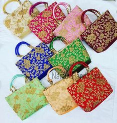 Lot Of 100 Indian Handmade Women Embroidered Heavy Work Hand Clutch Purse Potli Bag Pouch Drawstring Bag Wedding Favor Return Gift PRODUCT DETAIL :- -------------------------- Product Item : Potli Bags Size : Length- 23cm width- 22 cm Material : Fabrics, Beads Occasion: Any Occasion, Festive, Party, Wedding, Bridal PRODUCT DESCRIPTION :- This colorful Clutch Purse with vibrant colors & ethnically designed is a specialty from Rajasthan artisans. India comes to life through rich colors, lavish emb Indian Wedding Giveaways, Embroidered Clutch Purse, Embroidered Clutch Bag, Wedding Party Bags, Indian Wedding Favors, Giveaway Gifts, Potli Bag, Clutch Bag Wedding, Wedding Giveaways