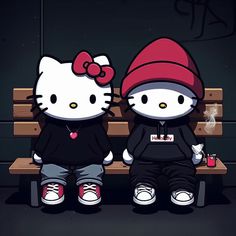 two hello kitty dolls sitting on a bench next to each other, one with a red hat