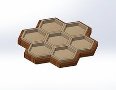 a wooden box with six hexagons cut out on the top and bottom