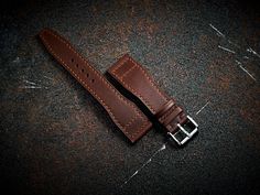 Highest quality IWC pilot/aviator style watch straps crafted from vachetta leather. With a superbly smooth top finish, our straps gives a feel in hand like no other leather. ---------- DETAIL: - PROCESS: 100% hand crafted, using only traditional tools and techniques. Designed to last a lifetime. - METERIAL: Full grain vachetta leather. Penetrating, non-fading dyed color. - THREAD: Premium linen thread - THICKNESS: around 2.5mm - DESIGN: 'Vintage' look leather pilot watch band and last for long. Classic Leather Watch Strap, Pilot Design, Iwc Pilot, Aviator Watch, Pilot Watch, Aviator Style, Veg Tan Leather, Design Vintage, Leather Band