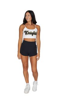 This super flattering UCF Knights White Spaghetti Tank Top is perfect for college game day paired with our UCF Game Day Skirt! One Size Fits Most. 88% Micropoly, 12% Spandex. Stretchy & soft fabric designed for all day use & long lasting quality. Sublimated Design. Machine wash on cold. Officially Licensed by Lo + Jo Bands. Casual 4-way Stretch Elastane Sports Bra, Casual Sports Bra With 4-way Stretch, Sporty Fitted Athletic Shorts For Cheerleading, Casual Sports Tank Top In Elastane, Casual Elastane Sports Tank Top, Sporty Spaghetti Straps Activewear For Sports, Sporty Sports Bra With Spaghetti Straps And Stretch, Sporty Sports Bra With Spaghetti Straps, Casual Activewear With Spaghetti Straps For Sports