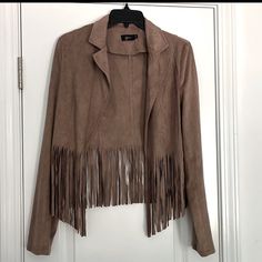 Faux Suede Fringe Jacket. Cropped Length. Never Worn. Size Medium. Chic Fringe Blazer For Fall, Spring Fringed Outerwear For Work, Chic Beige Outerwear With Fringe, Chic Beige Fringe Outerwear, Brown Long-sleeve Fringe Outerwear, Brown Fringe Outerwear For Spring, Suede Fringe Jacket, Fringe Jacket, Suede Fringe