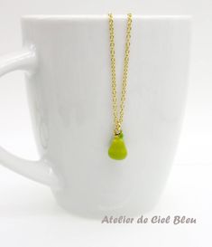 This dainty pear necklace is made of the followings: (1) gold plated green epoxy pear charm (14 x 8.5 mm) (2) gold plated or 14KGF chain and findings ✏️ Please choose the length of the chain (the length includes clasp and findings). ❣️ If you are unsure about which length to choose , please leave me a note to request an extension chain to be added to the chain at check out. 🍐EARRINGS 🍐 Hooks -> https://www.etsy.com/listing/919575709 🍐OTHER STYLE 🍐 YELLOW PEAR → https://www.etsy.com/listin Green Drop Necklace With Adjustable Chain As Gift, Handmade Pear-shaped Necklace Gift, Handmade Pear-shaped Gold Necklace, Handmade Pear-shaped Necklace For Gift, Gold Pear-shaped Drop Necklace For Gift, Yellow Teardrop Necklace For Gifts, Green Pear-shaped Necklace For Gift, Green Pear Shaped Necklace Gift, Green Pear Shaped Necklace For Gift