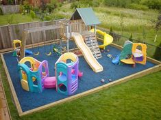 an outdoor play area with toys and slides