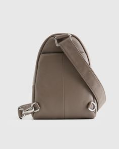 This Italian Leather Sling Pack is the epitome of luxury and versatility. Crafted from high-quality Italian leather, the sleek design features a single adjustable strap for easy carrying, while the spacious interior offers plenty of room for all your essentials. This pack can also be worn in multiple ways: wear it as a sling bag, or a crossbody. Add a touch of Italian elegance to your wardrobe with this timeless piece.  | Quince | Women's Italian Leather Sling Pack in Mink Formal Leather Backpack With Adjustable Strap, Modern Leather Crossbody Backpack With Leather Lining, Modern Leather Backpack With Detachable Strap For Formal Use, Modern Leather Backpack With Adjustable Strap For Formal Use, Modern Formal Leather Backpack With Adjustable Strap, Modern Leather Crossbody Backpack With Adjustable Strap, Modern Leather Backpack With Adjustable Strap For Office, Modern Leather Backpack For Office With Adjustable Strap, Elegant Leather Backpack With Adjustable Strap For Formal Use