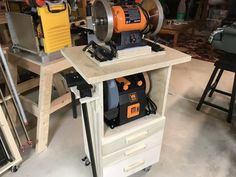 a workbench with tools on it in a shop