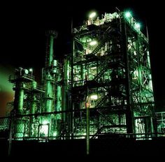 an industrial plant lit up at night