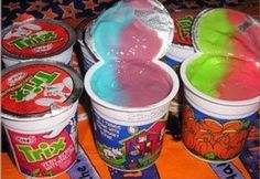 an image of some ice creams with different colors and flavors in them on the table