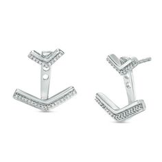 Surprise her with the shimmer and style of these diamond chevron front/back earrings. Crafted in sterling silver, each post earring features a sparkling diamond-adorned "V" shape that can be worn alone or with the larger diamond-lined chevron drop jacket that shows from beneath the earlobe. Radiant with 1/10 ct. t.w. of diamonds and a brilliant buffed luster, these versatile earrings secure comfortably with friction backs. Zales Zales, Front Back Earrings, Peoples Jewellers, Sparkle Diamonds, Diamond Stone, Earring Backs, Piercing Jewelry, Designer Earrings, V Shape