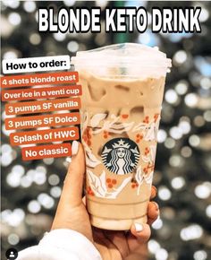 a woman holding up a starbucks drink with instructions on how to order and how to use it