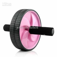 a pink wheel with black spokes on it