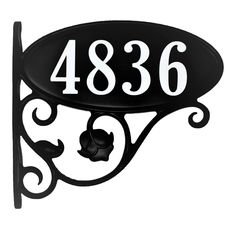 a black and white sign with the number 4836 on it's side is shown