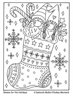 a christmas stocking with snowflakes and candy canes on it, in black and