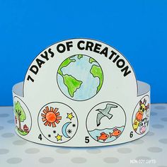 a paper crown with the words days of creation written on it and pictures of earth