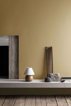 a lamp sitting on top of a wooden table