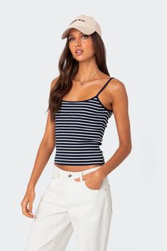 PRODUCT INFO Tank top Adjustable straps Striped fabric Cotton, Polyester, Spandex Model wears size S Model height is 5'7 Item care: Wash with similar color Striped Cotton Spaghetti Strap Tank Top, Casual White Strappy Camisole, Striped Tank Top Outfit, Navy Blue Tank Top, Tank Outfit, Tank Top Outfits, Stripe Outfits, Ribbed Tank Top, Swimwear Dress