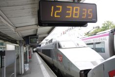 the train is stopped at the station for passengers to board