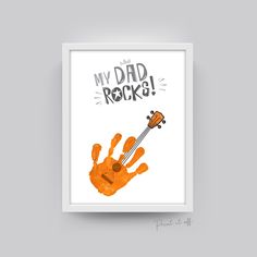 an orange handprint with the words w d dad rocks on it and a guitar