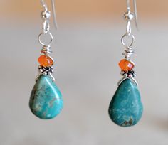 Pretty teardrop turquoise beads were used to create these earrings. They are accented with carnelian and silver beads. Silver wire wrapped. Sterling silver ear wires. Total length of earring is about an inch. Family Jewelry, Turquoise Earrings Dangle, Earring Designs, Country Blue, Family Jewellery, Handmade Beaded Jewelry, Beaded Jewelry Patterns