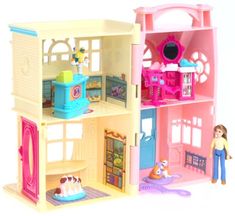 a doll house with dolls and furniture inside