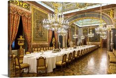 an ornate dining room with chandeliers and tables set for formal dinner or party