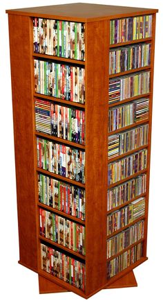 a tall wooden bookcase filled with lots of books and dvds on it's sides