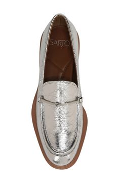 Add some equestrian polish with this comfortably padded loafer adorned by a slender bit on the vamp and styled with an almond moc toe and a sturdy sole. 1" heel (size 8.5) Cushioned insole Leather or synthetic upper/synthetic lining and sole Imported One or more major components contains at least 50% leather sourced from a tannery that has achieved a Leather Working Group rating for its energy use, waste production and water treatment Silver Loafers Outfit, Silver Loafers, Loafers Outfit, Franco Sarto, Casual Chic Outfit, The Vamps, Loafers For Women, On Shoes, Leather Working