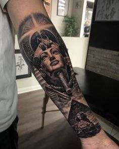 a man's arm with an image of a woman on the inside of it