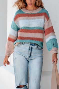 Expertly crafted for style and comfort, the Fresh Start Multi Striped Sweater is the perfect addition to any fall wardrobe! With its long sleeves, round neckline, and striped pattern, this sweater is effortlessly chic. Plus, the side slits and slightly oversized fit provide a flattering silhouette. Style with jeans, ankle booties, and a matching crossbody bag for an elevated boho chic look! Cozy Striped Sweater For Fall, Trendy Sweater With Striped Sleeves For Fall, Knit Sweater With Striped Sleeves For Fall, Striped Long Sleeve Knit Sweater, Crew Neck Knit Sweater With Striped Sleeves, Striped Knit Long Sleeve Sweater, Spring Horizontal Stripe Long Sleeve Sweater, Knit Crew Neck Sweater With Striped Sleeves, Knit Sweater With Striped Sleeves And Crew Neck