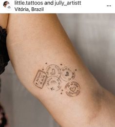 a woman's arm with tattoos on it and the words written in different languages