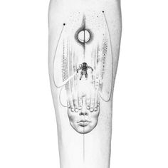 a black and white photo of a person's leg with an abstract design on it