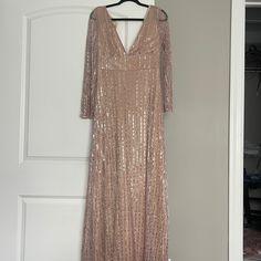 Brand New, Never Worn Beaded Long Dress. Color Is More Of A Pink/Rose Gold With Silver Sequins. V Neck With High Waist. Size Runs Accurate To A Size 4. Pink Sequin Formal Dress, Pink V-neck Sequin Evening Dress, Elegant Pink Sequin Fabric For Night Out, Elegant Pink Sequin Fabric For Holiday, Elegant Pink Holiday Sequin Fabric, Pink Long Sleeve Sequin Dress For Wedding, Pink Sequined Bridesmaid Evening Dress, Pink Sequined Evening Dress For Bridesmaid, Gold Beaded Dress