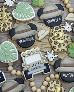 cookies decorated to look like safari animals and cars