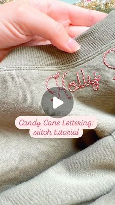 someone is stitching candy cane lettering on a sweater with the words candy cane lettering