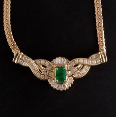 14k Yellow Gold Emerald Diamond Cluster Cocktail Italian Necklace 1.98ctw 10.88gMetal Information: 14k Yellow GoldTotal Weight: 10.88gChain Width: 3.1mmChain Length: 17.5"Pendant Dimensions: 16mm x 42.5mmAdditional Information: Made In ItalyStone InformationMain StoneGem Type: EmeraldShape: Emerald (7 x 5mm)Color: GreenClarity/Quality: BCarat Weight: 1.0ctNumber of Stones: 1Accent StoneGem Type: DiamondShape: Round (1.7mm)Color: HClarity/Quality: SI2Carat Weight: .02ctNumber of Stones: 28Accent Italian Necklace, Italian Gold Jewelry, Jewelry Website, Custom Jewelry Design, Gorgeous Jewelry, Emerald Diamond, Diamond Cluster, Estate Jewelry, Diamond Shapes